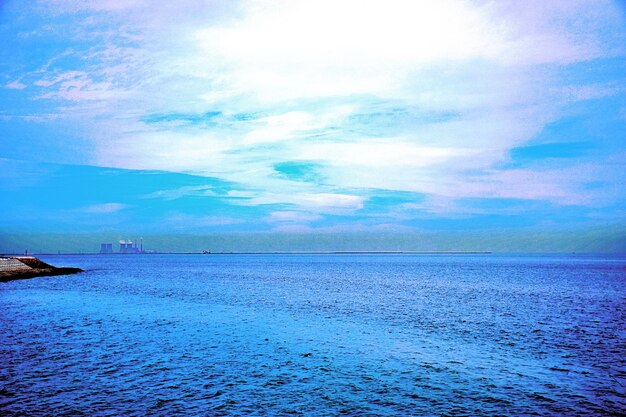 View of sea against cloudy sky