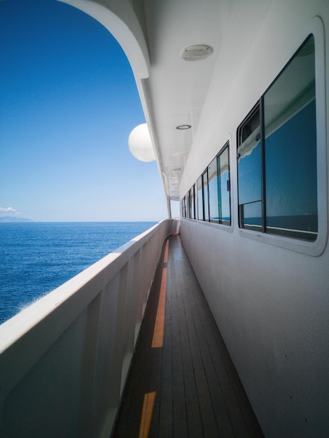 View of sea against sky seen through window