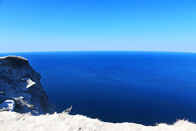 View of the sea from the cliff. Blurred horizon. Black Sea. Blurred background. Soft focus.