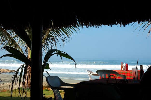 Photo view of sea seen from beach restaurant