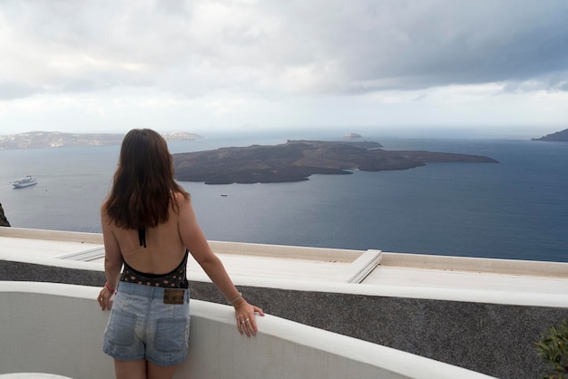 View to the sea and volcano from fira the capital of santorini island in greece