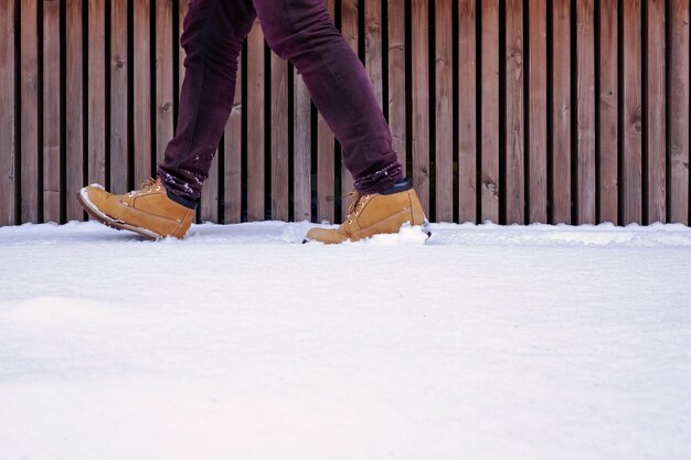 View of shoes or boots footprint in fresh snow