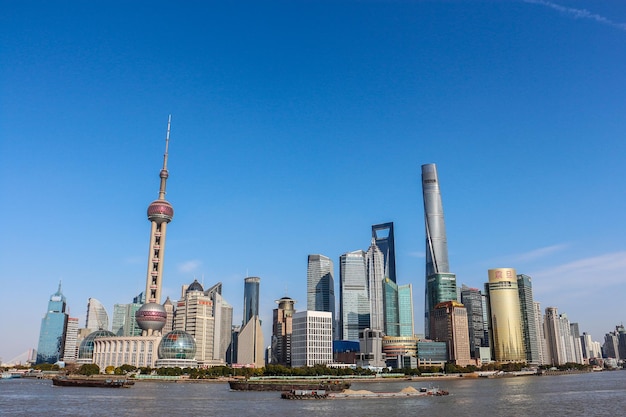 View of skyscrapers against clear blue sky