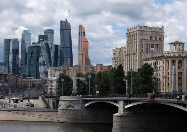 View of skyscrapers against cloudy sky