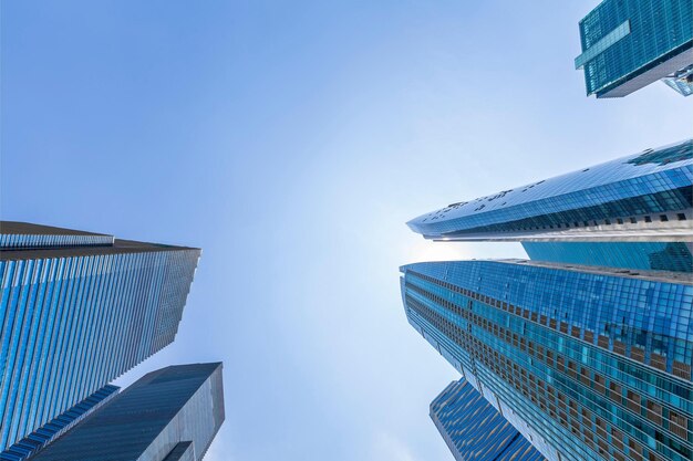 A view of a skyscrapers from the bottom of the sky