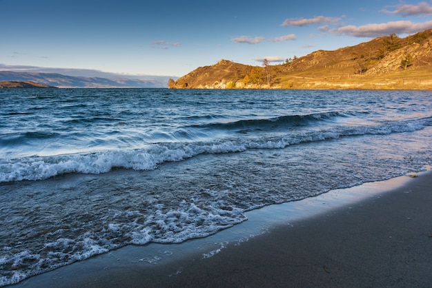 View of small sea strait on lake baikal on autumn day joy bay