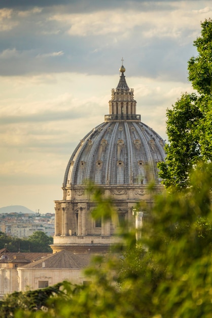 View of St Peter's basilica dome in Rome Italy