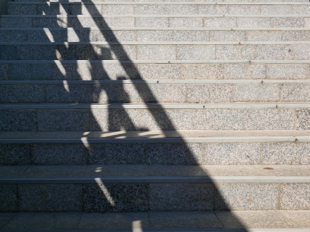 Photo view of stairs with daylight shadows