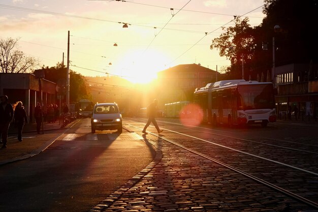 View of street in city at sunset