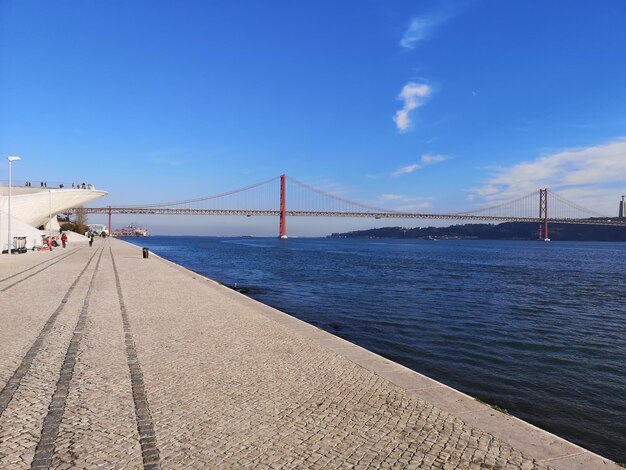 View of suspension bridge over sea