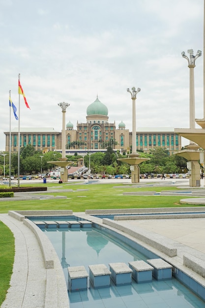 View of swimming pool in city against sky