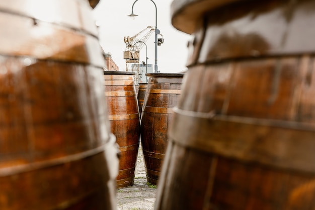 View of tables made with old oak barrels in a bar cafe restaurant on the Rambla del Puerto R