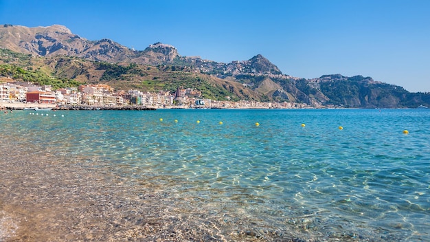 View of Taormina city and Giardini Naxos village