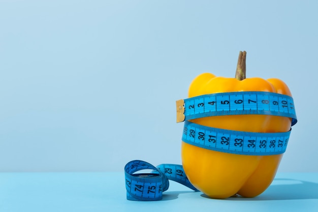 Photo view of tape measure with bell pepper