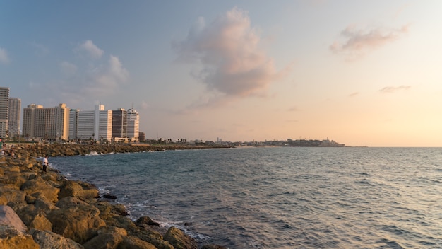 View of Tel Aviv from the Mediterranean Sea at evening.