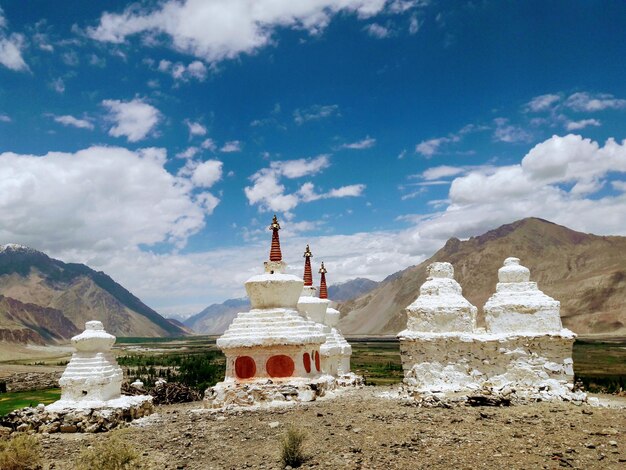 View of temple against cloudy sky