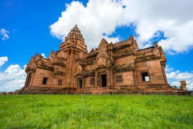 View of temple building against cloudy sky