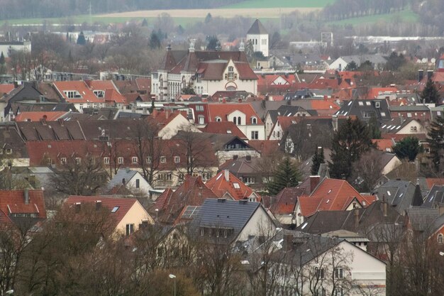 A view of a town with a church in the background