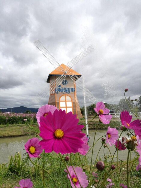 View of traditional windmill against sky