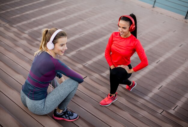 View at two young women exercise outside