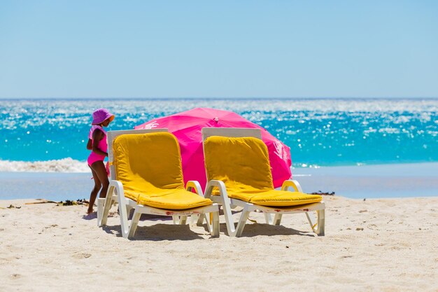 Photo view of vacationers on camps bay beach cape town