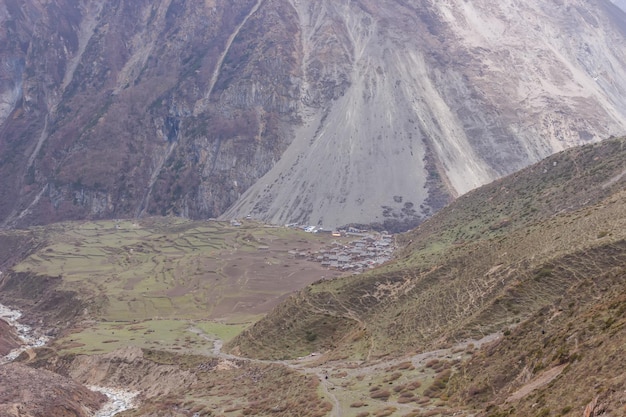 View of the valley and mountain peaks in the Manaslu region in the Himalayas