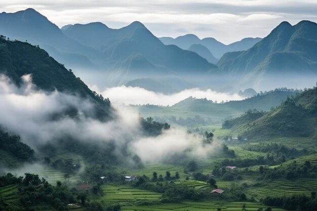 Photo a view of a valley with mountains and clouds in the background