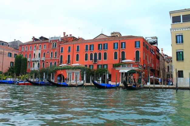 View of venice from the ship parked gondolas at the grand canal venice italy