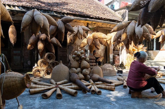 Premium Photo  View of vietnamese craftsman making the