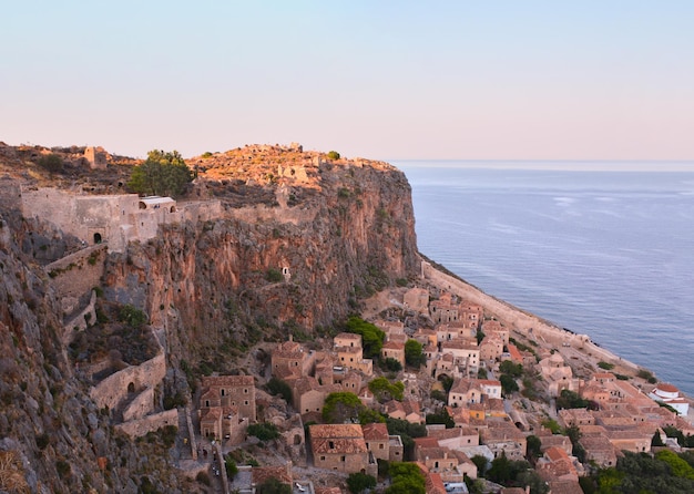 View of the village of Monemvasia from the Byzantine fortress on the Peloponnese in Greece at sunset
