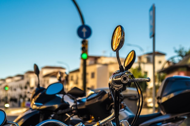 View of vintage motorcycles parked on the streets of Malaga