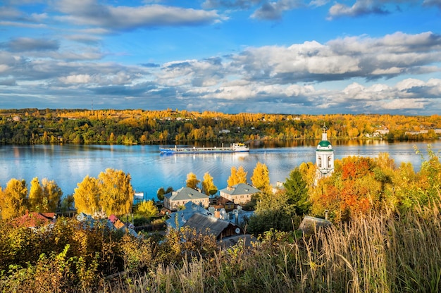 A view of the Volga River from the Levitan Mountain in the autumn Plyos and the Varvara Church