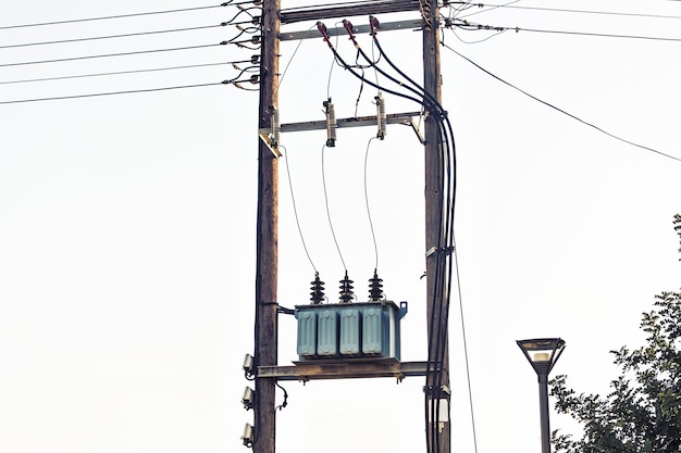 View of Voltage power transformer on electricity post