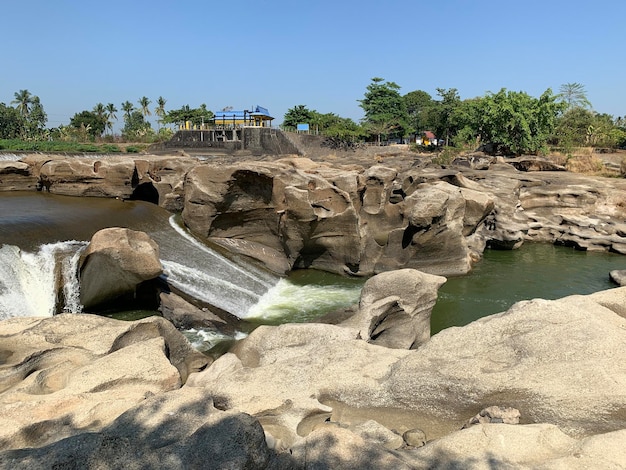 The view of the water in the dam during the dry season with its rocks is very beautiful