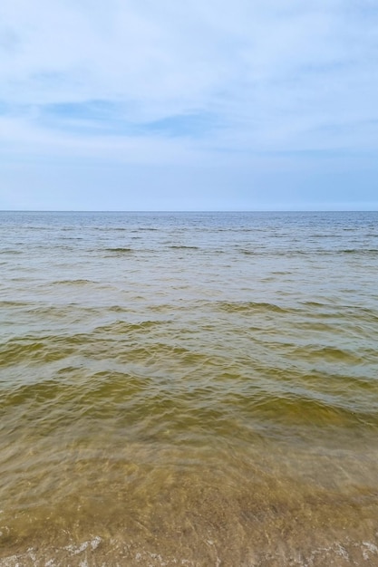 View of the water in the sea and the blue sky