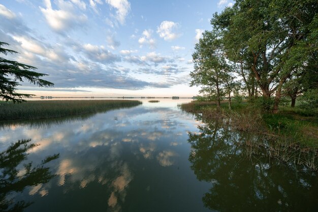 A view of the water and sky from the boat ramp