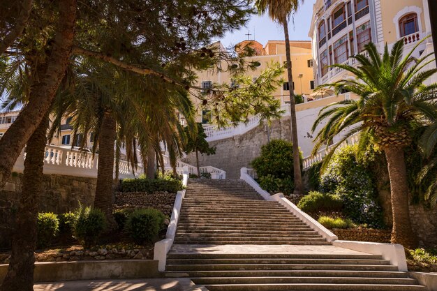 View of the white stairs in rochina park looking up to plaza espanya mahon menorca island spain