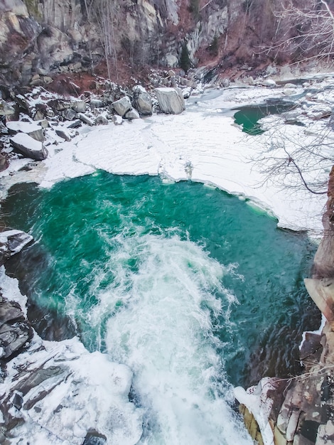 View of winter waterfall creek river copy space