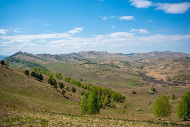 View with mountains and valley from top of the rock damn finger in the mountainous altai russia