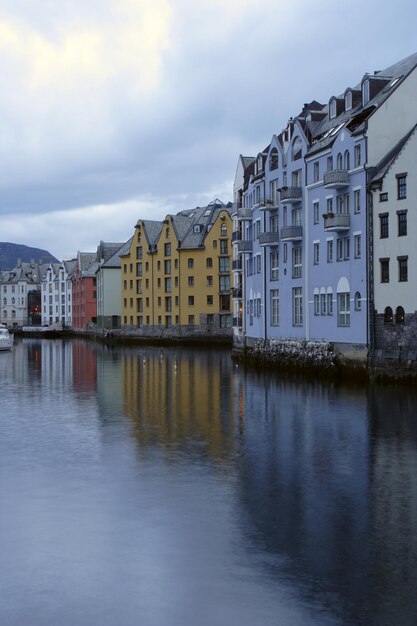 View with sea-front at the city of Alesund , Norway. White night time  shoot