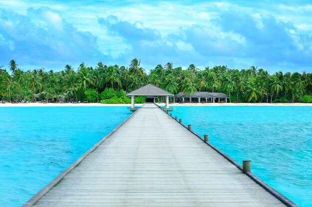 View of wooden pontoon at beautiful tropical resort