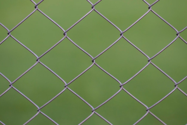 Views from the viewer through a steel mesh.