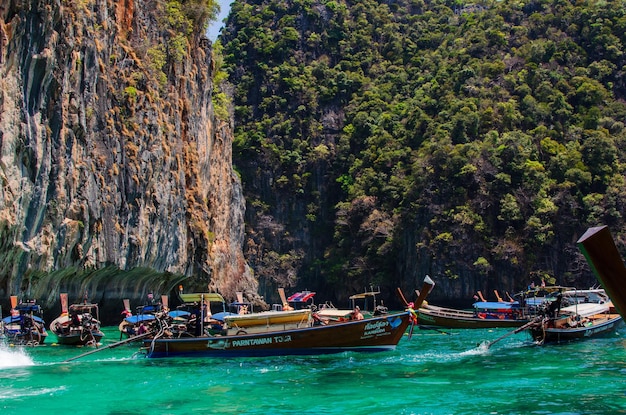 Views of the Islands of Thailand and turquoise water rocks yachts or boats