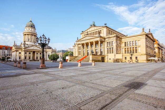 Viiew on the Gendarmenmarkt square with concert house building and German cathedral during the morning light in Berlin city