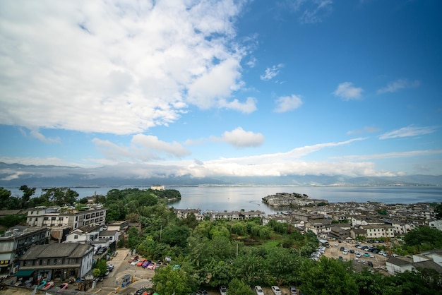 Village and lake in Shuanglang Yunnan China