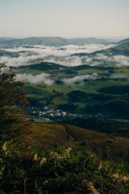 Village and road in mountains valley. Pyrenees. Camino de Santiago landscape. . High quality photo