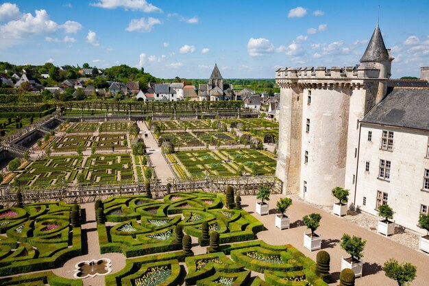 Villandry, France - April 20, 2014: Castle and gardens of Villandry. View of part of the castle and the garden of the park.