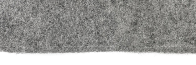 Vilt textuur Textuur van grijs vilt geïsoleerd op witte achtergrond Abstracte achtergrond met natuurlijk grijs vilt Hoge resolutie textuur foto