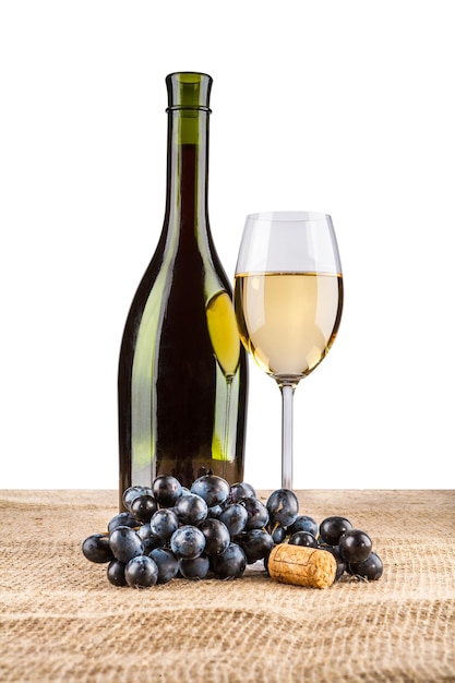 Vine bottle and glass with grape