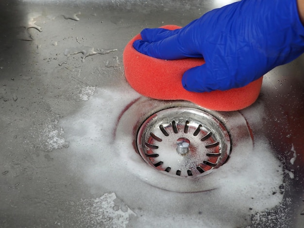 Vinegar and baking soda sponge for cleaning kitchen sink